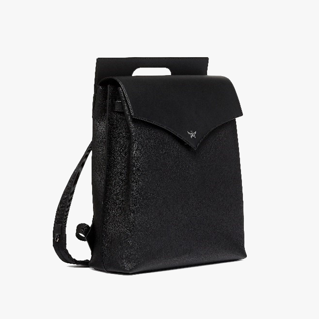 A black bag with a strap Description automatically generated