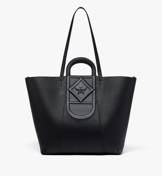 Ein Bild, das Zubehör, Tasche, Handtasche, Schultertasche enthält. Automatisch generierte Beschreibung